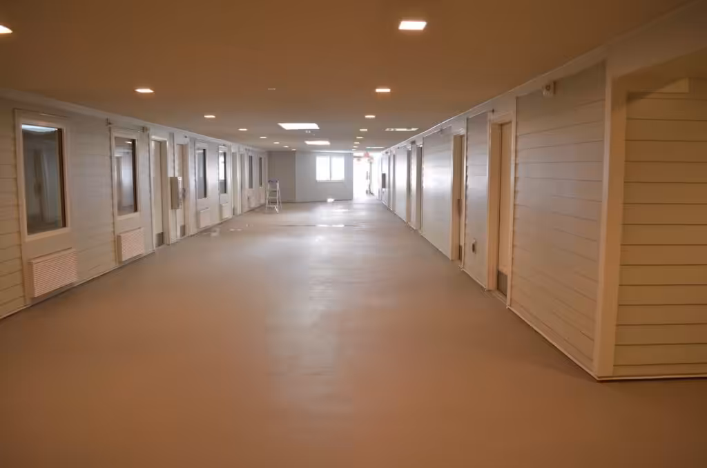 Epoxy flooring installation creating a sleek durable surface