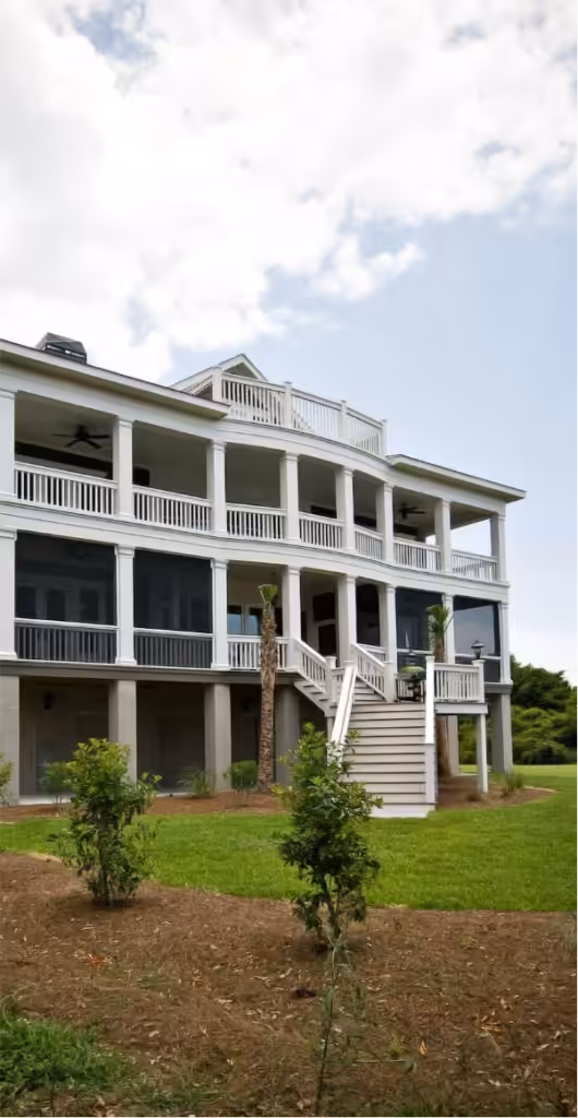 Beautiful white house with balconies showcasing exterior painting